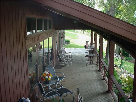 Wall of windows gives wonderful views from living room and kitchen.