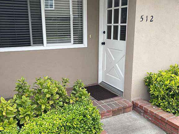 Entry door, kitchen window