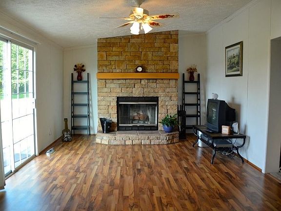 Family Room with Exit to the Rear Deck/ Backyard Oasis