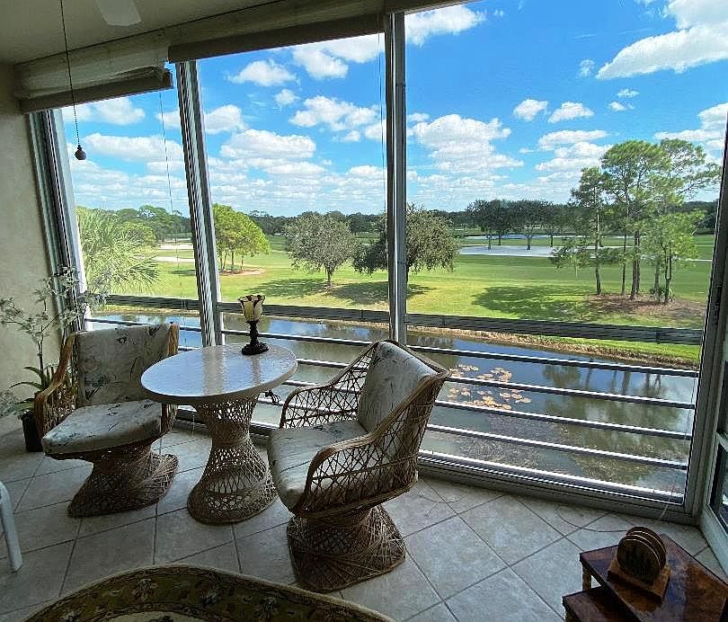 View from lanai shows canal along side of golf course.