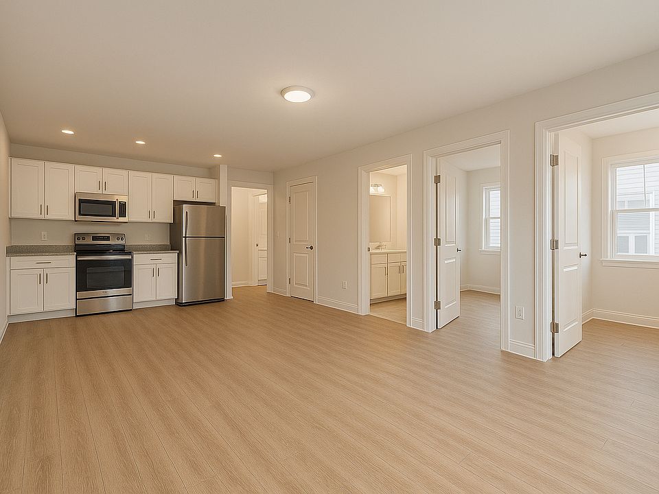 Disclaimer: This is a representative image and not an exact photo of the unit. Actual layout, finishes, and fixtures may vary. Renovated units will feature similar flooring and will have a full open kitchen.