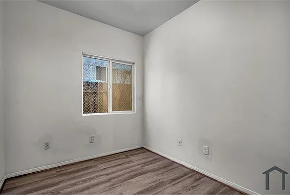 8318 S San Pedro St — Photo 6
