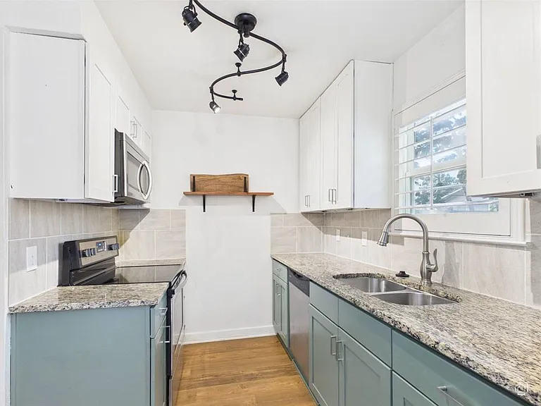 6211 Manor Rd #107 — Photo 26