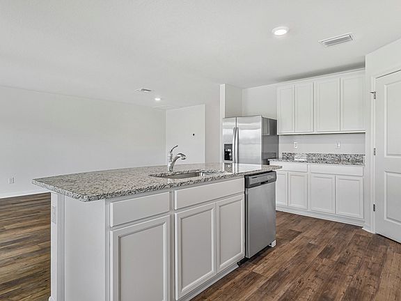 The Capri comes with a kitchen island that is ready to be the heart of your home