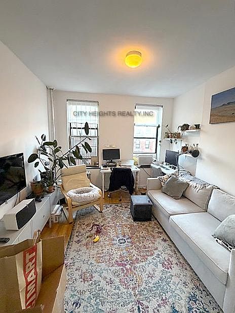 1st image of 512 E 12th St APT 14