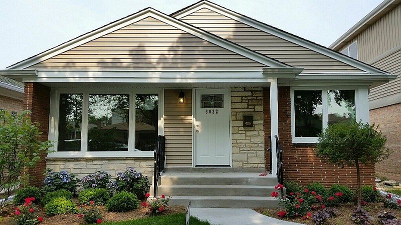 Great curb appeal on shady street
						:
						All new cement porches, patio and walkways. New roof & siding on home and garage