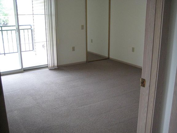 12x12 bedroom with attached bath and large walk-in closet