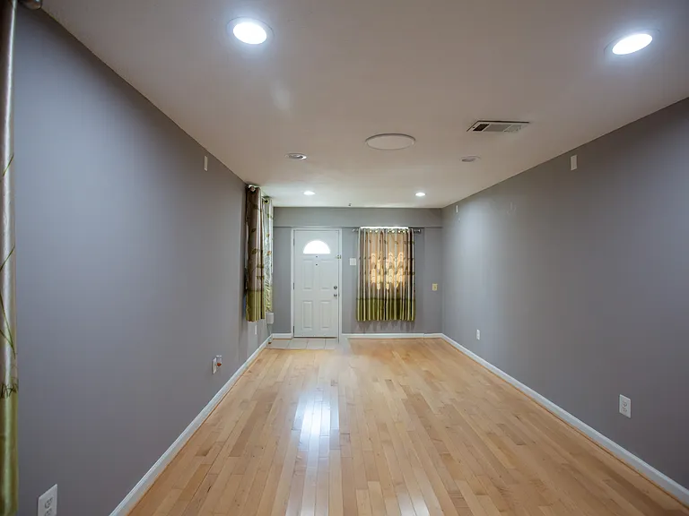 Downstairs bedroom 4 (Walkout Basement)The white door opens to the front of the house