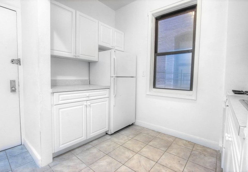 2nd image of 157 E 2nd St APT 3A