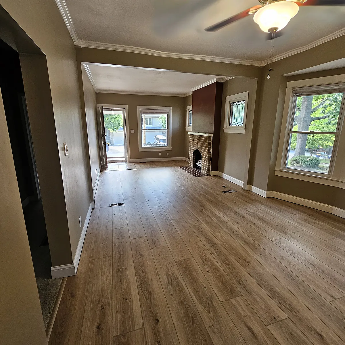 Living room Dining room from kitchen wall. - 4512 Bell St