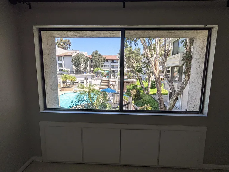 Master bedroom with view to the pool