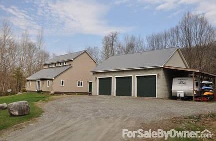 View coming up the driveway.
						:
						House and Garage - Camper-port / Covered Parking 30' Deep
