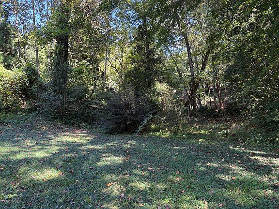 Wooded area at back of property for privacy