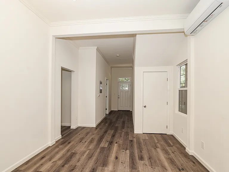 Kitchen and dining area with updated flooring