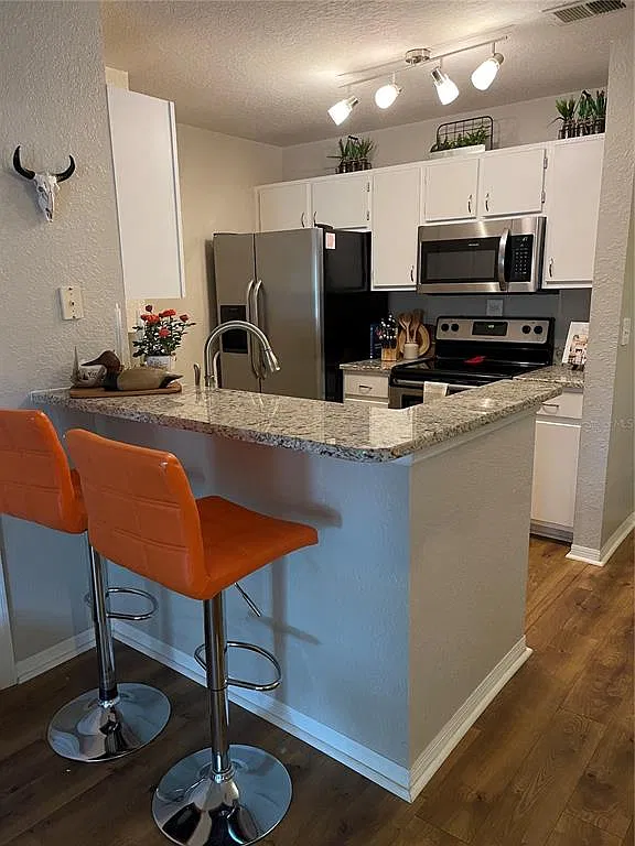 8917 Manor Loop — Photo 1