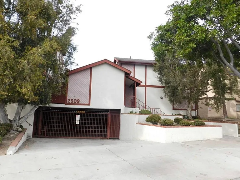 Building & entry to 2 parking spaces