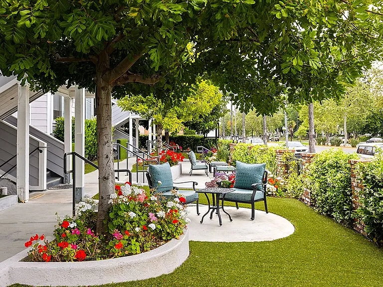 Outdoor patios and seating areas facing Corbin Ave.
