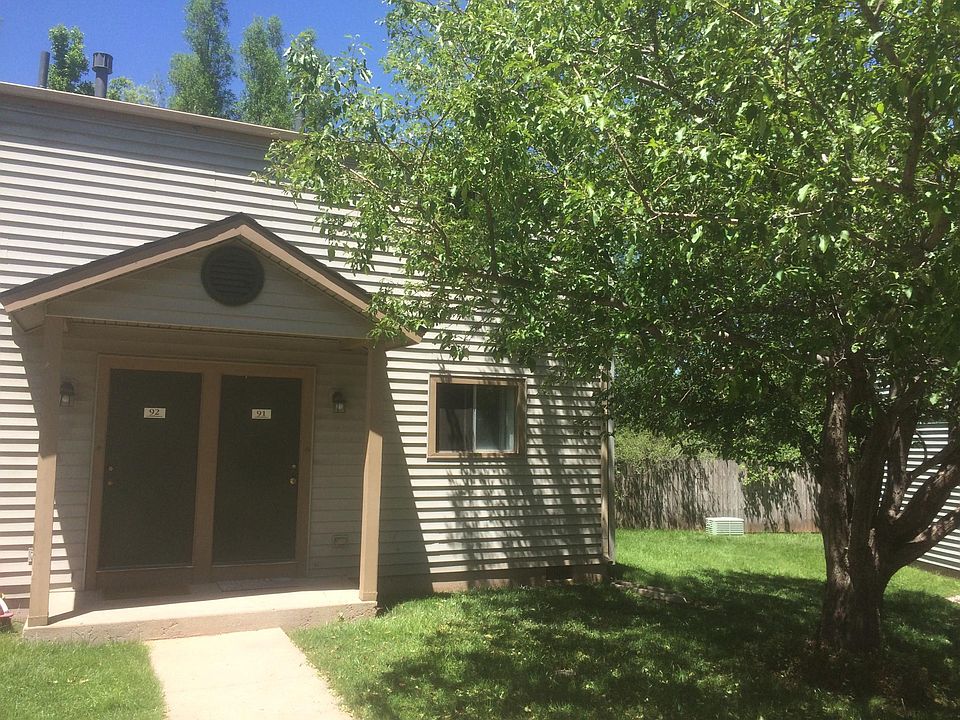 Apartment is on right hand side, with beautiful tree in fron