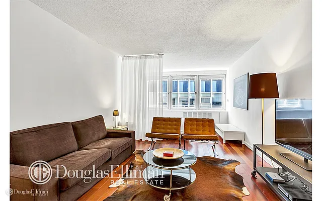 Sold by Douglas Elliman | media 9