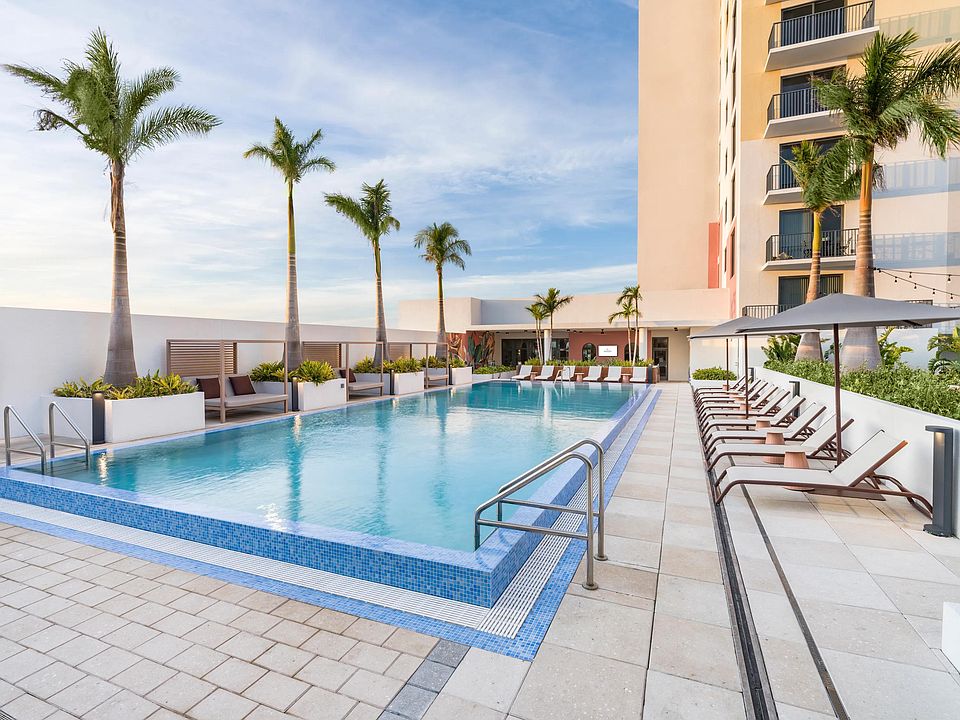 Relax in style with our resort-style pool, cabanas, and lounge seating.