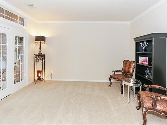 Formal living room offers lots of possibilities.  Use this room as a study, reading nook or a music room!