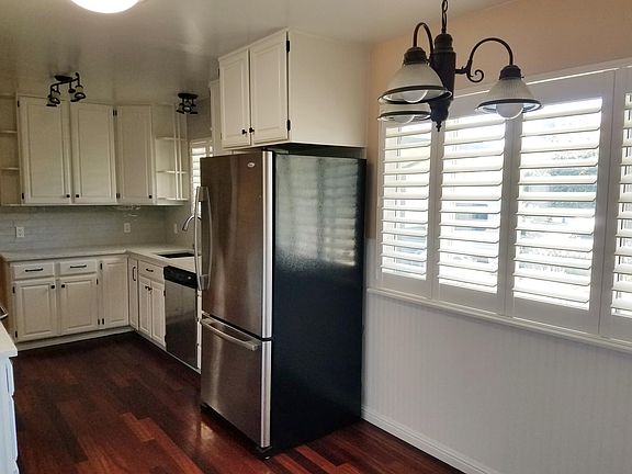 Kitchen with refrigerator