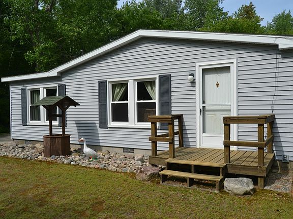 The front of the home has a front porch that will bring your guest into the front of the home.