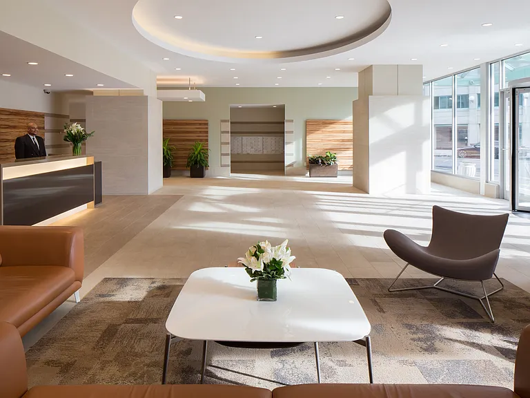 A welcoming lobby with doorman service, adding convenience to your everyday life