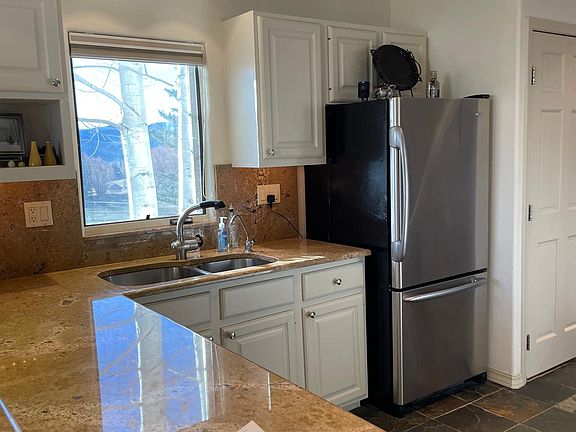Kitchen. end unit so window looks our over golf course.