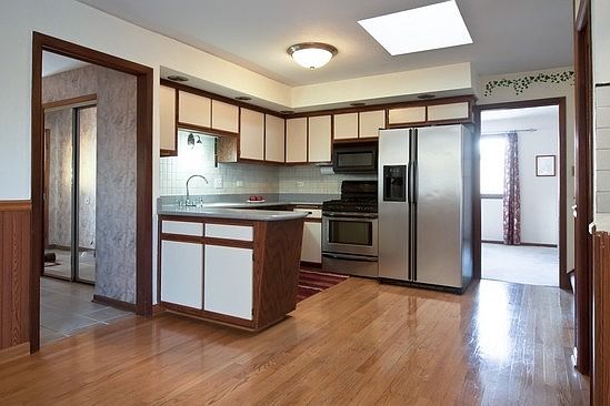 4th image of 10721 E Olympia Cir