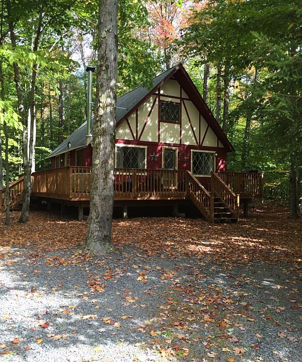Nestled in a wooded lot.