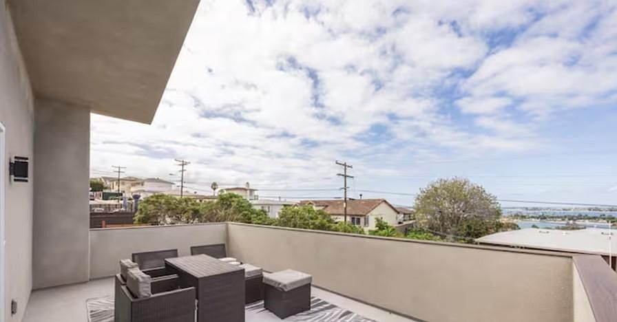 View from large deck onto Mission Bay and the Pacific Ocean.