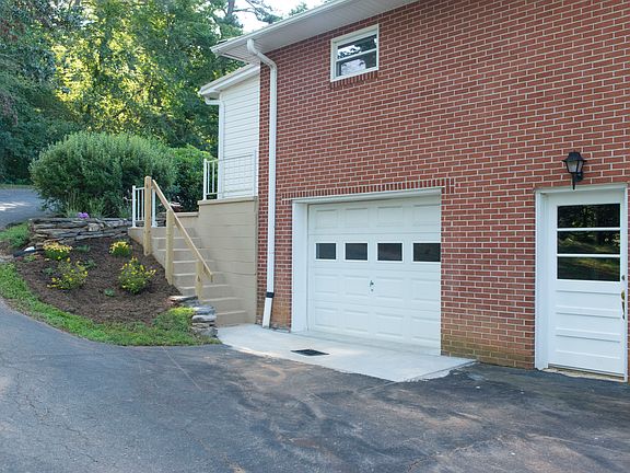 garage with door to workshop