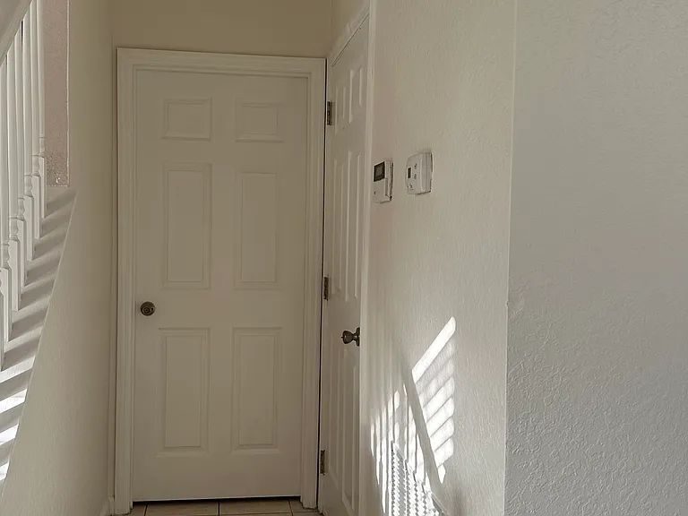 Entrace to Garage and Half Bathroom