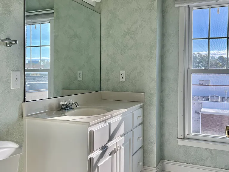 There's plenty of natural light in the spacious hall bathroom.