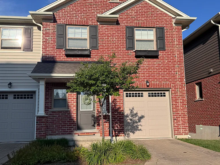 114-3025 Singleton Ave, 1 car garage + driveway for a second car