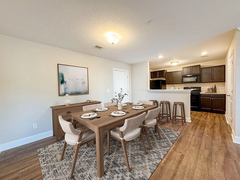 Dining area upon entry with views to kitchen