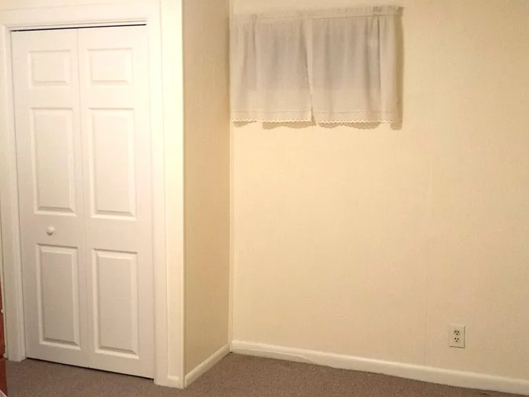 West bedroom closet with current doors