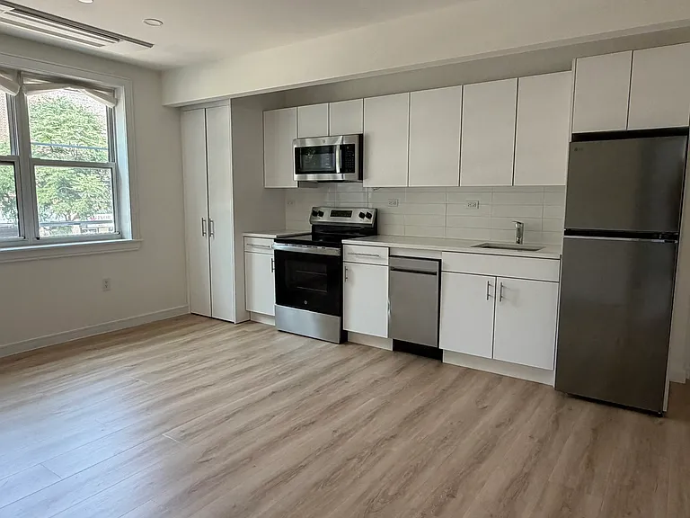 39-38 47th Ave #210 — Photo 3
