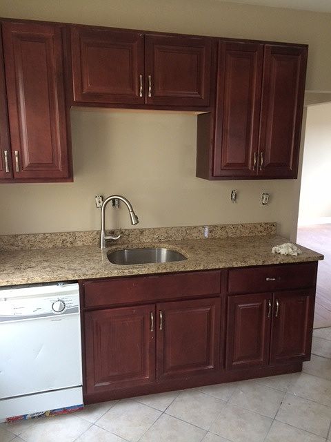 fitted kitchen with granite counter tops