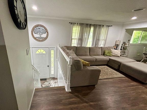 Front entry way leading to upstairs and downstairs