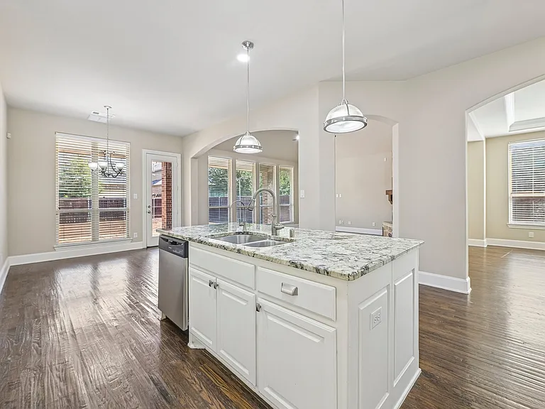 Open concept eat in kitchen.