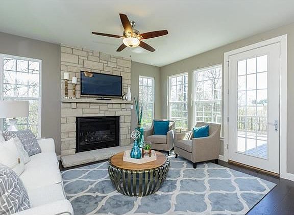 Hearth Room with Floor to Ceiling Stone Fireplace