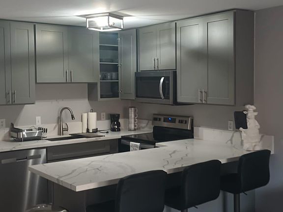 fully updated kitchen quartz calcutta countertop