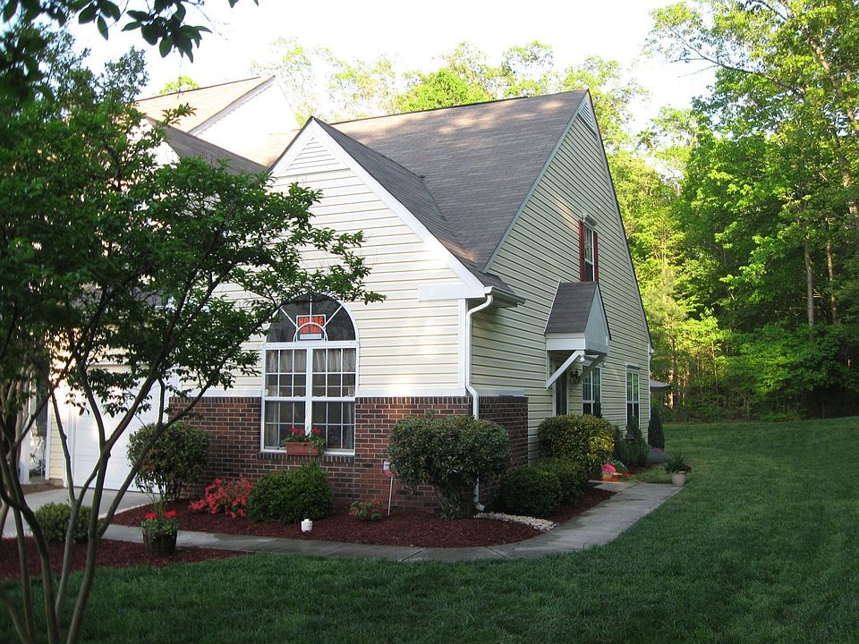 Wooded end lot offers so much privacy