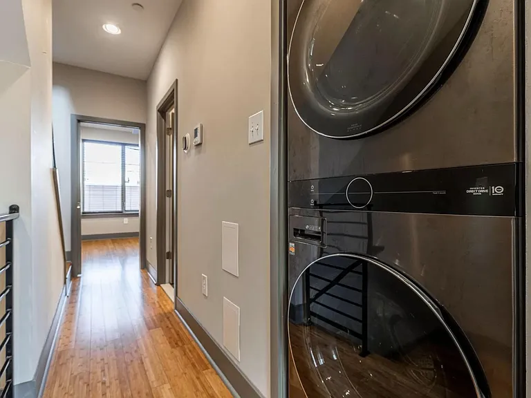 2nd floor hallway with brand new washer dryer with wifi notifications