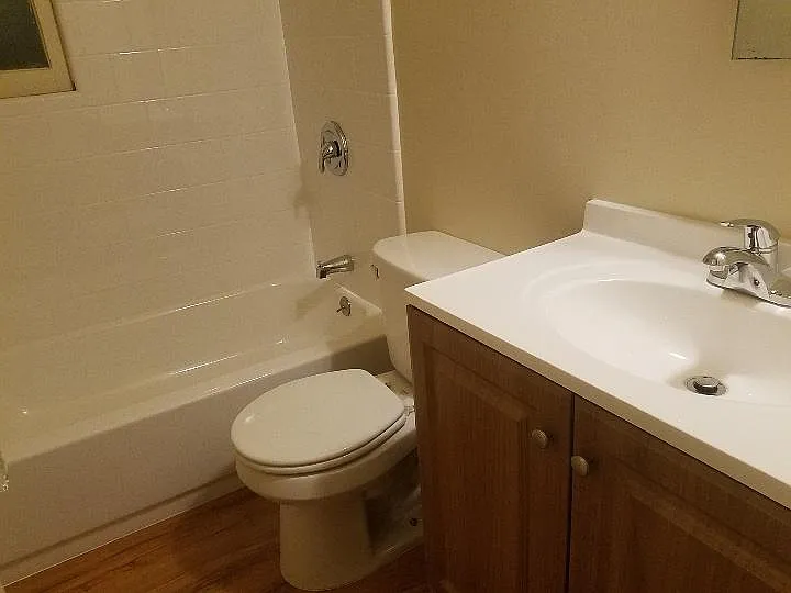 New sink vanity, new tile & bathtub