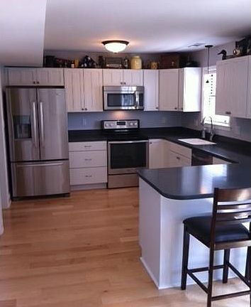 Wood floors and Corian countertops!
