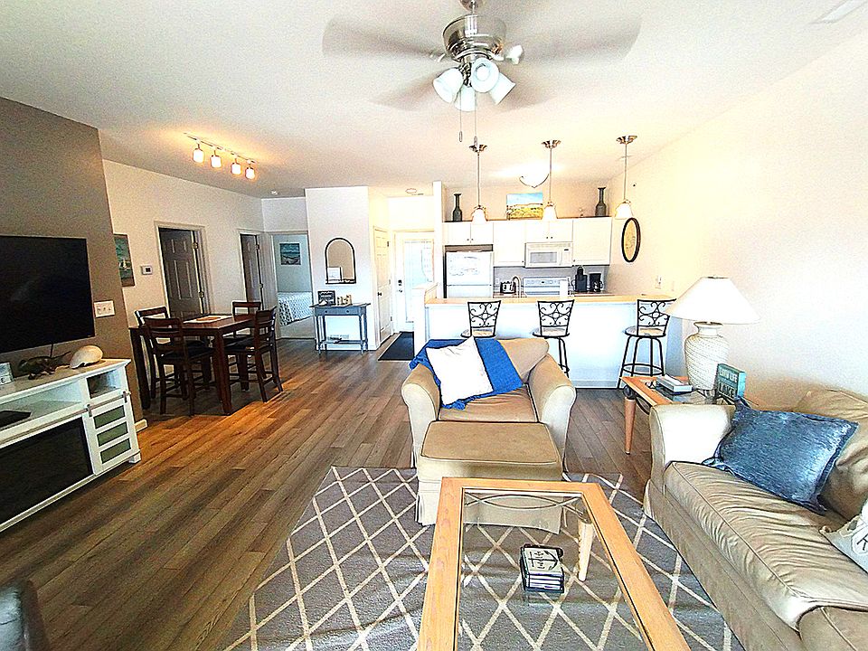 Living room, dining room and kitchen.