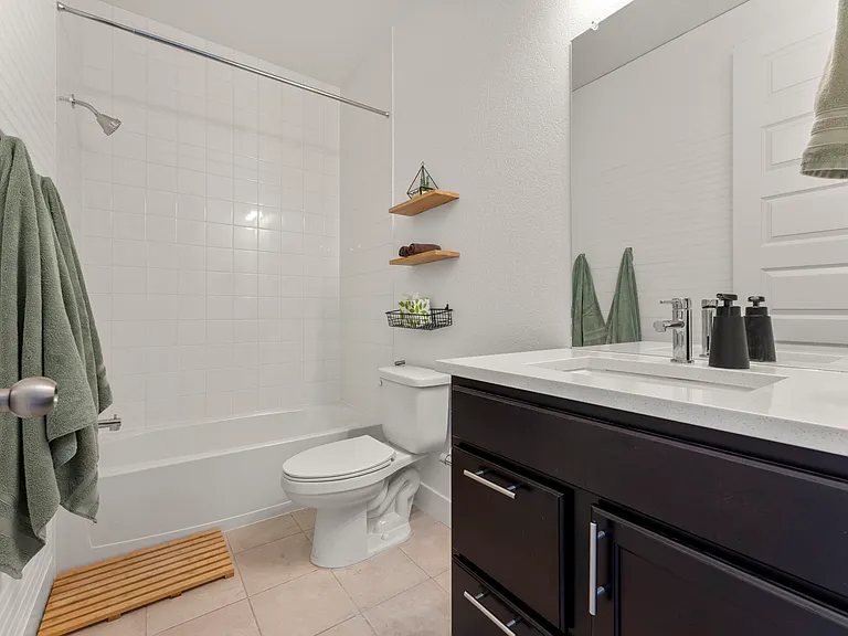 Guest bathroom located upstairs